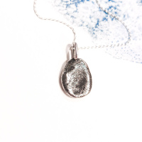 Pendentif empreinte