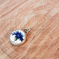 Pendentif en céramique bleuet